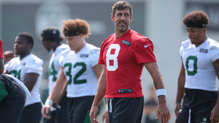 Jul 27, 2024; Florham Park, NJ, USA; New York Jets quarterback Aaron Rodgers (8) looks back during training camp at Atlantic Health Jets Training Center.