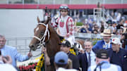 May 17, 2025; Baltimore, Maryland, USA; Journalism (2) with Umberto Rispoli up is lead into the winners circle after winning the Preakness Stakes at Pimlico Race Course in Baltimore, MD.  Mandatory Credit: Gregory Fisher-Imagn Images
