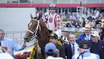 May 17, 2025; Baltimore, Maryland, USA; Journalism (2) with Umberto Rispoli up is lead into the winners circle after winning the Preakness Stakes at Pimlico Race Course in Baltimore, MD.  Mandatory Credit: Gregory Fisher-Imagn Images