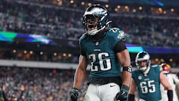 Jan 26, 2025; Philadelphia, PA, USA; Philadelphia Eagles running back Saquon Barkley (26) celebrates after a touchdown against the Washington Commanders during the second half in the NFC Championship game at Lincoln Financial Field. Mandatory Credit: Bill Streicher-Imagn Images