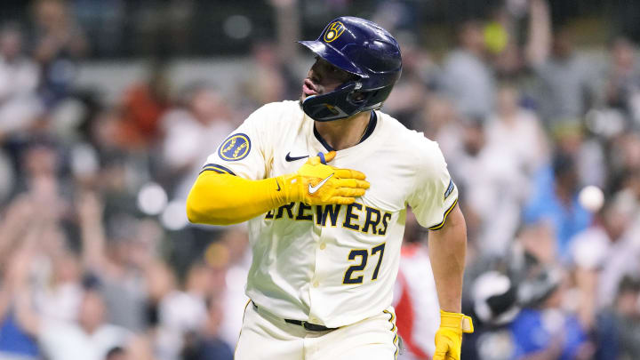 Aug 27, 2024; Milwaukee, Wisconsin, USA;  Milwaukee Brewers shortstop Willy Adames (27) celebrates after hitting a home run during the sixth inning against the San Francisco Giants at American Family Field. Mandatory Credit: Jeff Hanisch-USA TODAY Sports