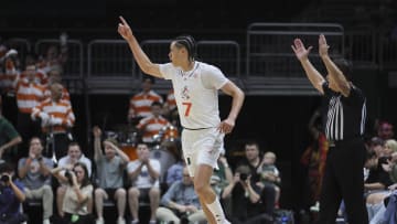 Feb 3, 2024; Coral Gables, Florida, USA; Miami Hurricanes guard Kyshawn George (7) reacts after