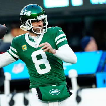 New York Jets quarterback Aaron Rodgers (8) warms up before the game, Sunday January 5, 2025, in East Rutherford.