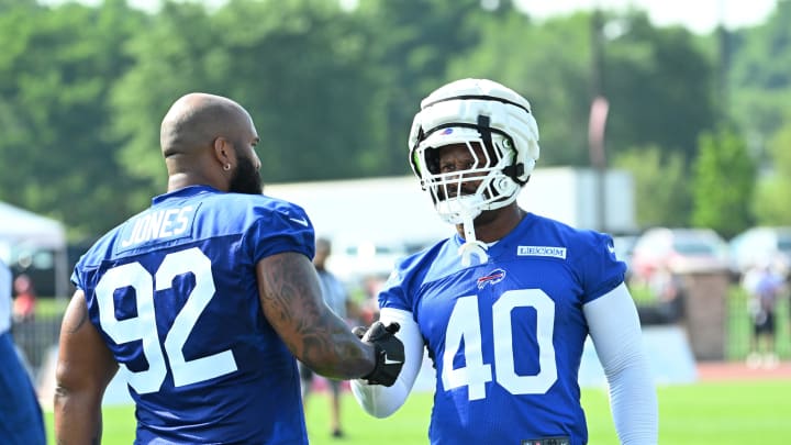 Jul 24, 2024; Rochester, NY, USA; Buffalo Bills linebacker Von Miller (40) greets defensive tackle DaQuan Jones (92) during a training camp session at St. John Fisher University. Mandatory Credit: Mark Konezny-USA TODAY Sports