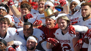 Oklahoma coach Brent Venables and the Golden Hat Trophy