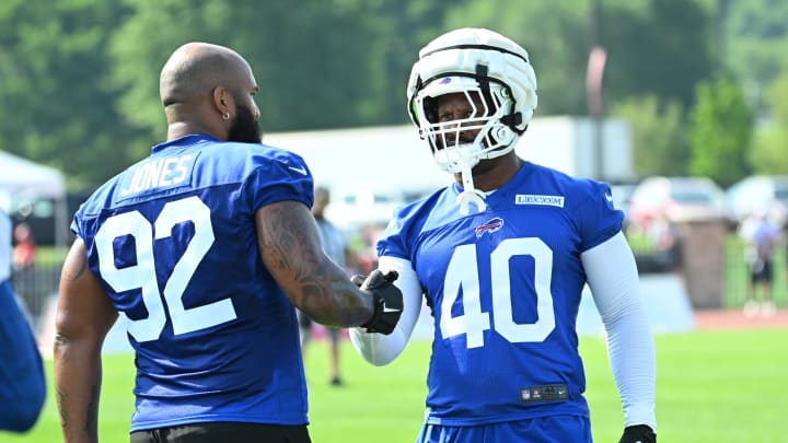 Jul 24, 2024; Rochester, NY, USA; Buffalo Bills linebacker Von Miller (40) greets defensive tackle DaQuan Jones (92) during a training camp session at St. John Fisher University. Mandatory Credit: Mark Konezny-USA TODAY Sports