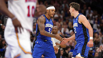 Feb 27, 2025; Orlando, Florida, USA; Orlando Magic forward Paolo Banchero (5) and forward Franz Wagner (22) celebrate after a basket against the Golden State Warriors in the second quarter at Kia Center. Mandatory Credit: Nathan Ray Seebeck-Imagn Images