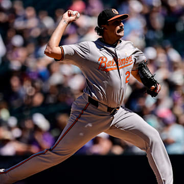 Sep 1, 2024; Denver, Colorado, USA; Baltimore Orioles starting pitcher Zach Eflin (24) pitches in the first inning against the Colorado Rockies at Coors Field.