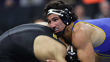 AJ Ferrari of CSU Bakersfield wrestles Stephen Buchanan of Iowa during the semifinals of the NCAA Wrestling Championships at Wells Fargo Center.