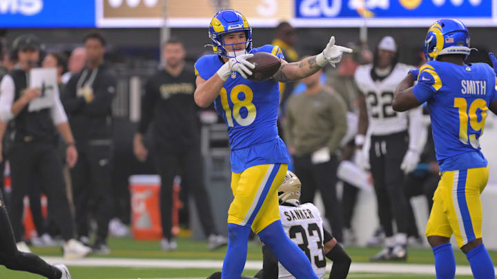 Nov 2, 2025; Inglewood, California, USA; Los Angeles Rams tight end Terrance Ferguson (18) reacts after making a 45-yard reception against the New Orleans Saints during the first half at SoFi Stadium. Mandatory Credit: Jayne Kamin-Oncea-Imagn Images