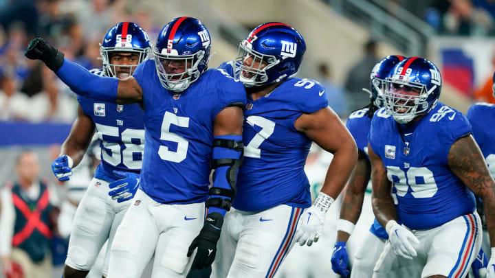 New York Giants linebacker Kayvon Thibodeaux (5) celebrates a sack with the defense in the first half at MetLife Stadium on Monday, Oct. 2, 2023, in East Rutherford.