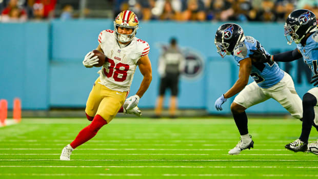 San Francisco 49ers running back Cody Schrader (38) runs the ball against the Tennessee Titans 