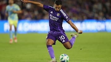 Feb 22, 2025; Orlando, Florida, USA; Orlando City midfielder Martin Ojeda (10) kicks the ball against the Philadelphia Union in the first half at Inter&Co Stadium. Mandatory Credit: Morgan Tencza-Imagn Images