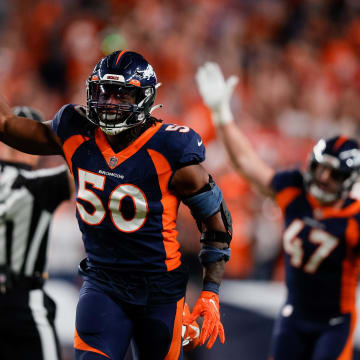 Sep 25, 2022; Denver, Colorado, USA; Denver Broncos linebacker Jonas Griffith (50) celebrates after an interception in the fourth quarter against the San Francisco 49ers at Empower Field at Mile High. Mandatory Credit: Isaiah J. Downing-USA TODAY Sports