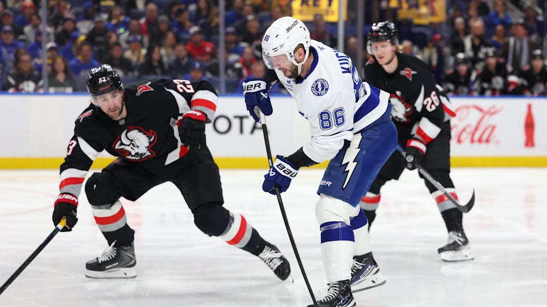 Apr 6, 2026; Buffalo, New York, USA;  Buffalo Sabres defenseman Mattias Samuelsson (23) looks to block a shot by Tampa Bay Lightning right wing Nikita Kucherov (86) during the third period at KeyBank Center. Mandatory Credit: Timothy T. Ludwig-Imagn Images
