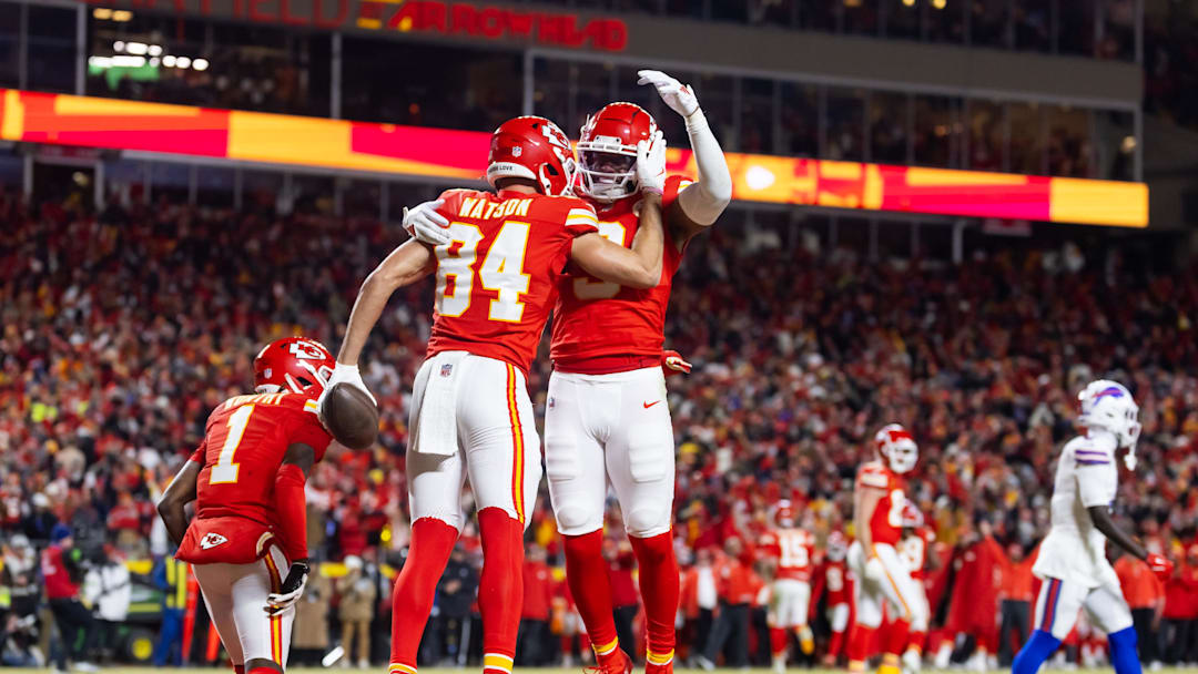 Jan 26, 2025; Kansas City, MO, USA; Kansas City Chiefs wide receiver Justin Watson (84) celebrates a catch for a two point conversion with teammate JuJu Smith-Schuster (9) against the Buffalo Bills during the second half in the AFC Championship game at GEHA Field at Arrowhead Stadium. Mandatory Credit: Mark J. Rebilas-Imagn Images