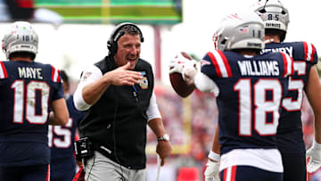 New England Patriots head coach Mike Vrabel, with wide receiver Kyle Williams.