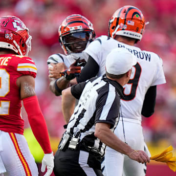 Cincinnati Bengals quarterback Joe Burrow (9) attempts to hold back wide receiver Ja'Marr Chase (1) as he continues to shout at a referee in the fourth quarter of the NFL Week 2 game between the Kansas City Chiefs and the Cincinnati Bengals at Arrowhead Stadium in Kansas City on Sunday, Sept. 15, 2024. The Chiefs took a 26-25 win with a go-ahead field goal as time expired.