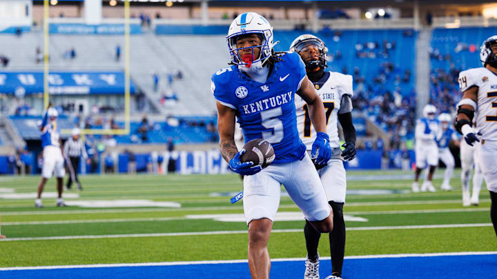 Nov 16, 2024; Lexington, Kentucky, USA; Kentucky Wildcats wide receiver Anthony Brown-Stephens (5) runs into the end zone for a touchdown during the fourth quarter at Kroger Field. Mandatory Credit: Jordan Prather-Imagn Images