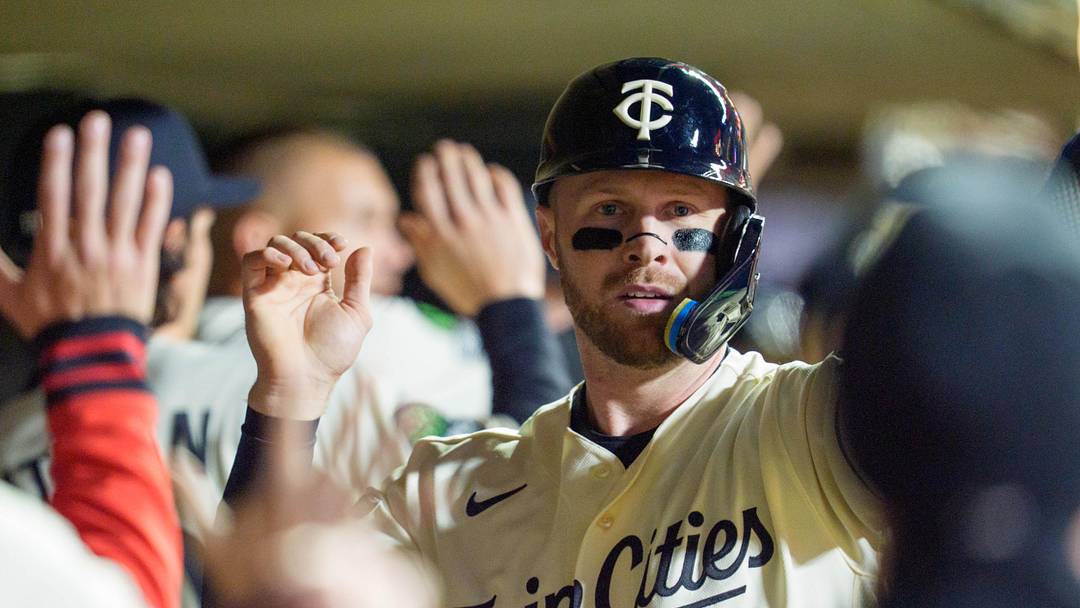 Apr 30, 2026; Minneapolis, Minnesota, USA; Minnesota Twins catcher Ryan Jeffers (27) is congratulated by teammates after scoring against the Toronto Blue Jays in the eighth inning at Target Field. Mandatory Credit: Matt Blewett-Imagn Images