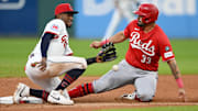 Jun 9, 2025; Cleveland, Ohio, USA; Cincinnati Reds first baseman Christian Encarnacion-Strand (33) steals second as Cleveland Guardians second baseman Angel Martinez (1) waits for the throw during the seventh inning at Progressive Field. Mandatory Credit: Ken Blaze-Imagn Images