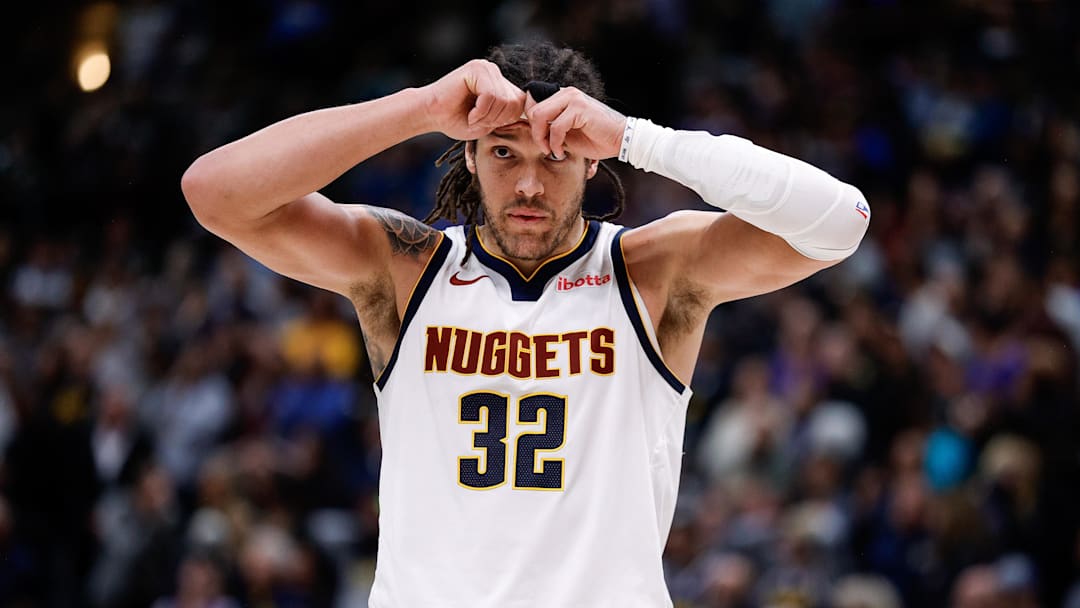 Apr 1, 2025; Denver, Colorado, USA; Denver Nuggets forward Aaron Gordon (32) reacts after a foul call at the end of double overtime against the Minnesota Timberwolves at Ball Arena. Mandatory Credit: Isaiah J. Downing-Imagn Images