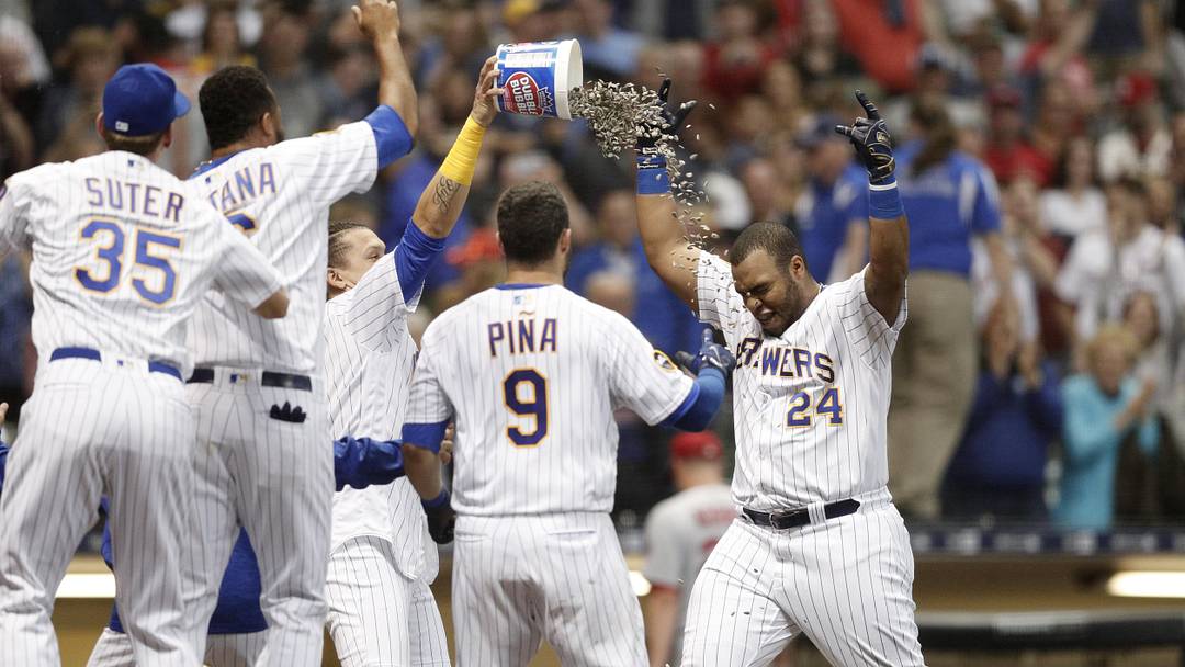 Jun 22, 2018; Milwaukee, WI, USA; Milwaukee Brewers first baseman Jesus Aguilar (24) celebrates after hitting a walk off home run during the ninth inning against the St. Louis Cardinals at Miller Park. Mandatory Credit: Jeff Hanisch-Imagn Images Jun 22, 2018; Milwaukee, WI, USA; Milwaukee Brewers first baseman Jesus Aguilar (24) celebrates after hitting a walk off home run during the ninth inning against the St. Louis Cardinals at Miller Park. Mandatory Credit: Jeff Hanisch-Imagn Images