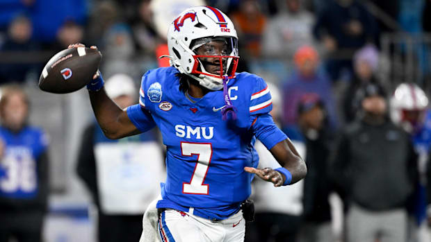 SMU quarterback Kevin Jennings prepares to throw the football during the ACC championship game against Clemson.