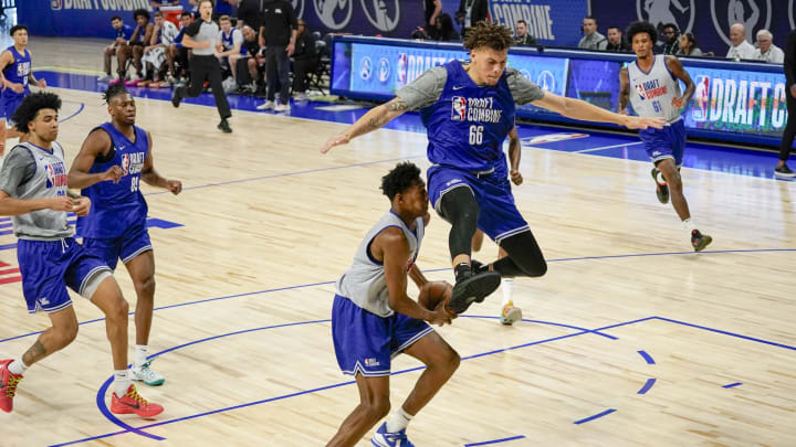 May 15, 2024; Chicago, IL, USA; Coleman Hawkins (66) and Nae’Qwan Tomlin (10) participate during the 2024 NBA Draft Combine at Wintrust Arena. Mandatory Credit: David Banks-USA TODAY Sports