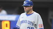Sep 10, 2025; Cleveland, Ohio, USA; Kansas City Royals major league field coordinator, third base coach Vance Wilson (25) stands on the field in the second inning against the Cleveland Guardians at Progressive Field.