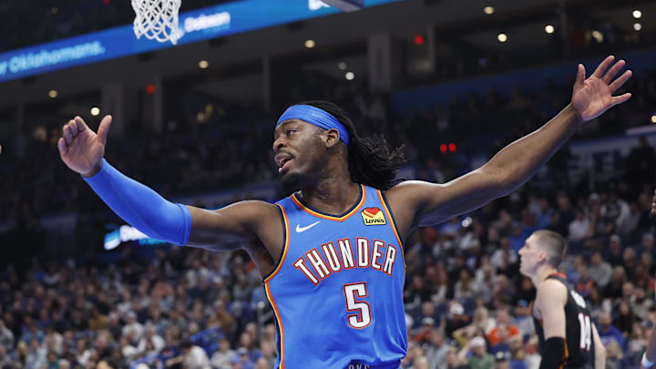 Feb 12, 2025; Oklahoma City, Oklahoma, USA; Oklahoma City Thunder guard Luguentz Dort (5) reacts after a play against the Miami Heat during the second quarter at Paycom Center. Mandatory Credit: Alonzo Adams-Imagn Images