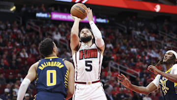 Nov 20, 2024; Houston, Texas, USA; Houston Rockets guard Fred VanVleet (5) shoots the ball as Indiana Pacers guard Tyrese Haliburton (0) defends during the second quarter at Toyota Center. Mandatory Credit: Troy Taormina-Imagn Images