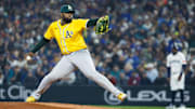Mar 27, 2025; Seattle, Washington, USA; Athletics starting pitcher Luis Severino (40) throws against the Seattle Mariners during the first inning at T-Mobile Park. Mandatory Credit: Joe Nicholson-Imagn Images