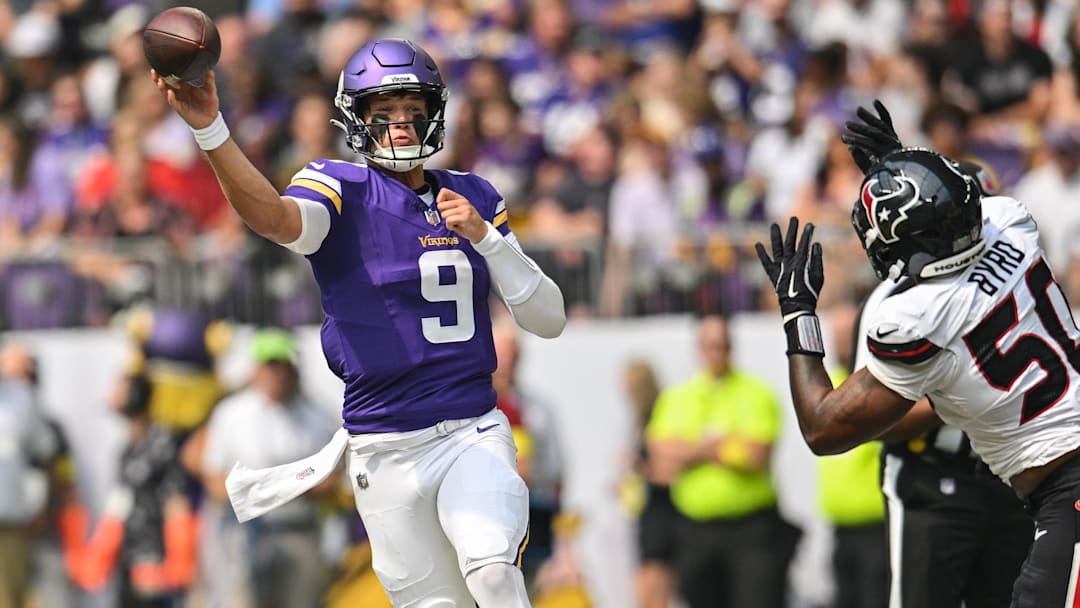 Aug 9, 2025; Minneapolis, Minnesota, USA; Minnesota Vikings quarterback J.J. McCarthy (9) throws a pass as Houston Texans defensive end Solomon Byrd (50) pursues during the first quarter at U.S. Bank Stadium.