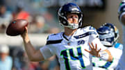 Seattle Seahawks quarterback Sam Darnold (14) looks to pass during the third quarter of an NFL football matchup, Sunday, Oct. 12, 2025, at EverBank Stadium in Jacksonville, Fla. The Seahawks defeated the Jaguars 20-12.