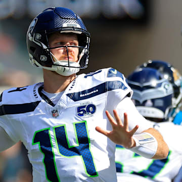 Seattle Seahawks quarterback Sam Darnold (14) looks to pass during the third quarter of an NFL football matchup, Sunday, Oct. 12, 2025, at EverBank Stadium in Jacksonville, Fla. The Seahawks defeated the Jaguars 20-12.
