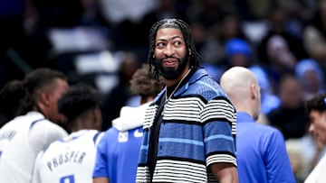 Feb 27, 2025; Dallas, Texas, USA;  Dallas Mavericks forward Anthony Davis laughs during a timeout against the Charlotte Hornets during the first half at American Airlines Center. Mandatory Credit: Kevin Jairaj-Imagn Images