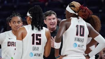 Aug 17, 2025; San Francisco, California, USA;  Atlanta Dream head coach Karl Smesko talks with the team during a timeout in the third quarter against the Golden State Valkyries at Chase Center. Mandatory Credit: David Gonzales-Imagn Images