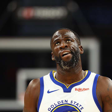 Dec 12, 2023; Phoenix, Arizona, USA; Golden State Warriors forward Draymond Green (23) reacts against the Phoenix Suns at Footprint Center. Mandatory Credit: Mark J. Rebilas-Imagn Images