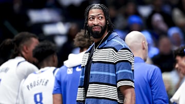 Feb 27, 2025; Dallas, Texas, USA;  Dallas Mavericks forward Anthony Davis laughs during a timeout against the Charlotte Hornets during the first half at American Airlines Center. Mandatory Credit: Kevin Jairaj-Imagn Images