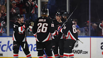 Apr 17, 2025; Buffalo, New York, USA;  Buffalo Sabres center Ryan McLeod (71) celebrates his goal with teammates during the third period against the Philadelphia Flyers at KeyBank Center. Mandatory Credit: Timothy T. Ludwig-Imagn Images