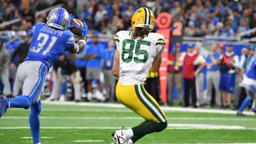 Nov 6, 2022; Detroit, Michigan, USA; Detroit Lions safety Kerby Joseph (31) steps in from of Green Bay Packers tight end Robert Tonyan (85) to intercept a pass from Packers quarterback Aaron Rodgers (12) (not pictured) in the third quarter at Ford Field. Mandatory Credit: Lon Horwedel-USA TODAY Sports