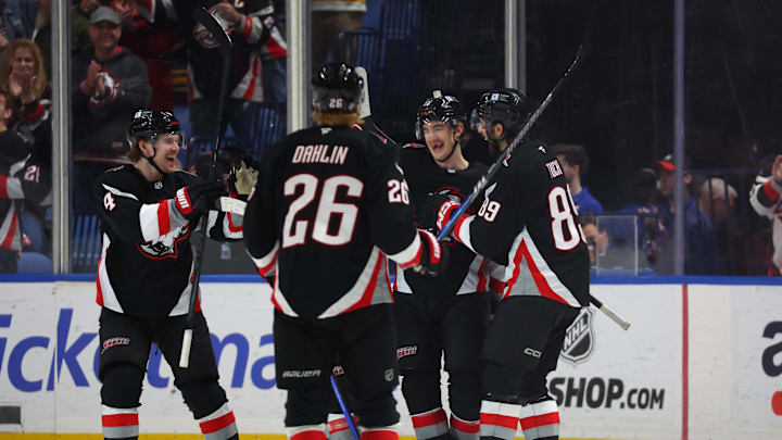 Apr 17, 2025; Buffalo, New York, USA;  Buffalo Sabres center Ryan McLeod (71) celebrates his goal with teammates during the third period against the Philadelphia Flyers at KeyBank Center. Mandatory Credit: Timothy T. Ludwig-Imagn Images