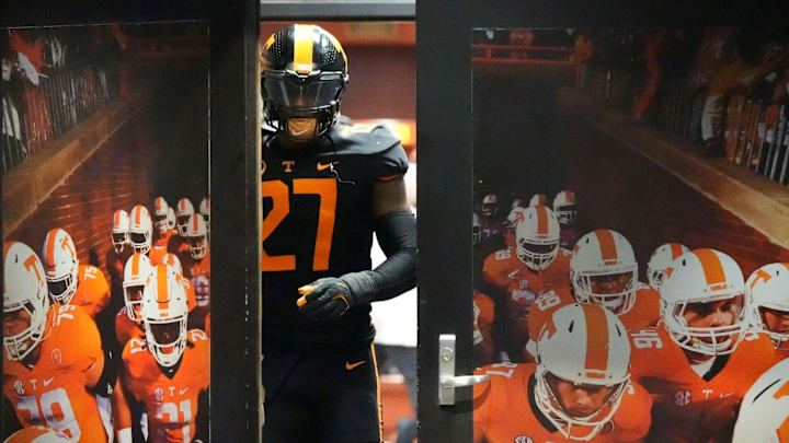 Tennessee defensive lineman James Pearce Jr. (27) walks out of the locker room to start the second half of the NCAA college football game against Kentucky on Saturday, Nov. 2, 2024, in Knoxville, Tenn. (I've been trying to get this photograph of a single player leaving the Tennessee locker room for a few years but it never worked out quite right until James Pearce Jr. showed up) Tennessee defensive lineman James Pearce Jr. (27) walks out of the locker room to start the second half of the NCAA college football game against Kentucky on Saturday, Nov. 2, 2024, in Knoxville, Tenn. (I've been trying to get this photograph of a single player leaving the Tennessee locker room for a few years but it never worked out quite right until James Pearce Jr. showed up)