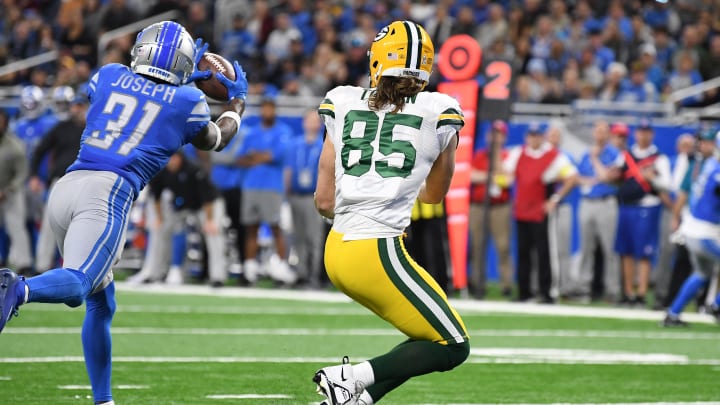 Nov 6, 2022; Detroit, Michigan, USA; Detroit Lions safety Kerby Joseph (31) steps in from of Green Bay Packers tight end Robert Tonyan (85) to intercept a pass from Packers quarterback Aaron Rodgers (12) (not pictured) in the third quarter at Ford Field. Mandatory Credit: Lon Horwedel-USA TODAY Sports