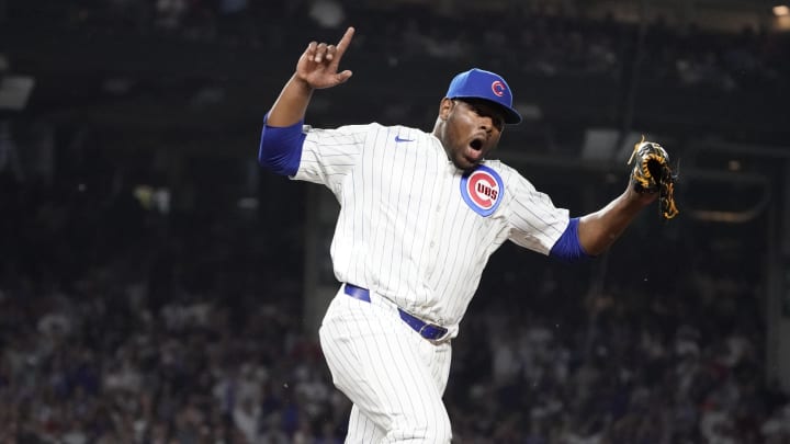 Jun 4, 2024; Chicago, Illinois, USA; Chicago Cubs pitcher Hector Neris (51) reacts after the final out against the Chicago White Sox during the eighth inning at Wrigley Field. 