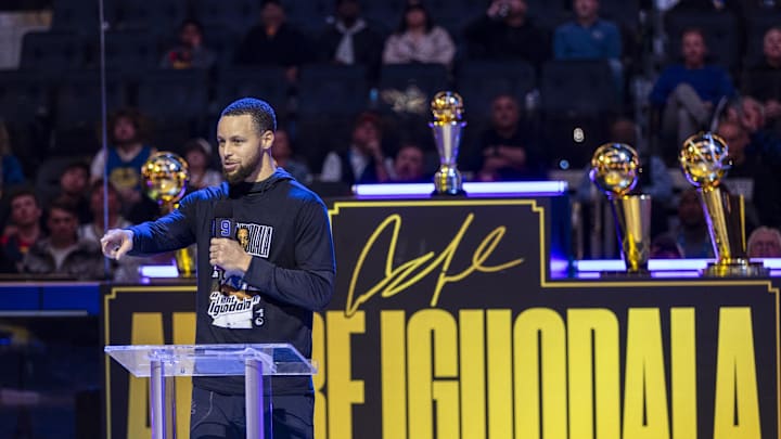 Golden State Warriors guard Stephen Curry (30) talks during the Andre Iguodala jersey retirement ceremony at Chase Center.