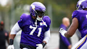 Vikings left tackle Christian Darrisaw practices at TCO Performance Center