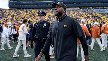 Michigan coach Sherrone Moore walks off the field after his team's 31-12 loss to Texas at Michigan Stadium in Ann Arbor on Saturday, Sept. 7, 2024.