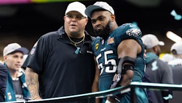 Philadelphia Eagles defensive end Brandon Graham (55) with team security guard Dom DiSandro after defeating the Kansas City Chiefs during Super Bowl LIX at Ceasars Superdome.